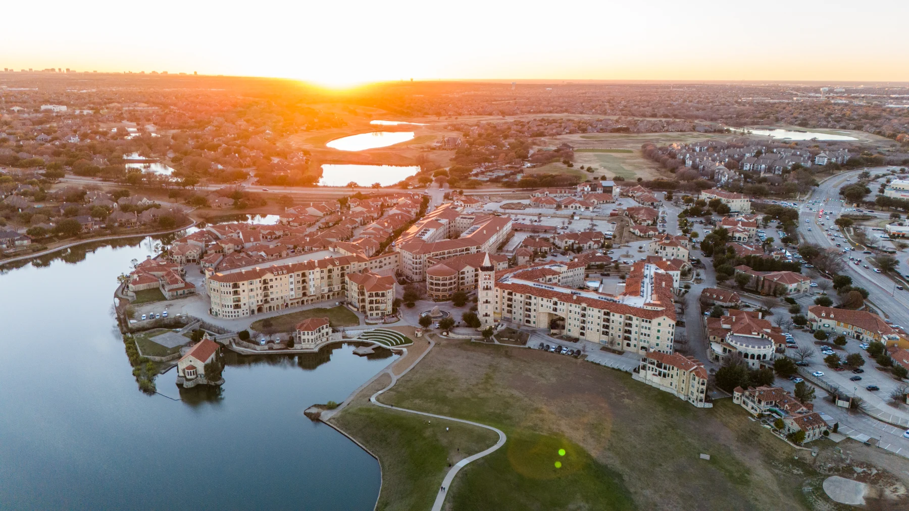 Adriatica Village and its lake in McKinney at sunset, photographed in 2024